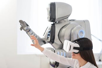 Employee testing augmented and virtual reality technology in the workplace