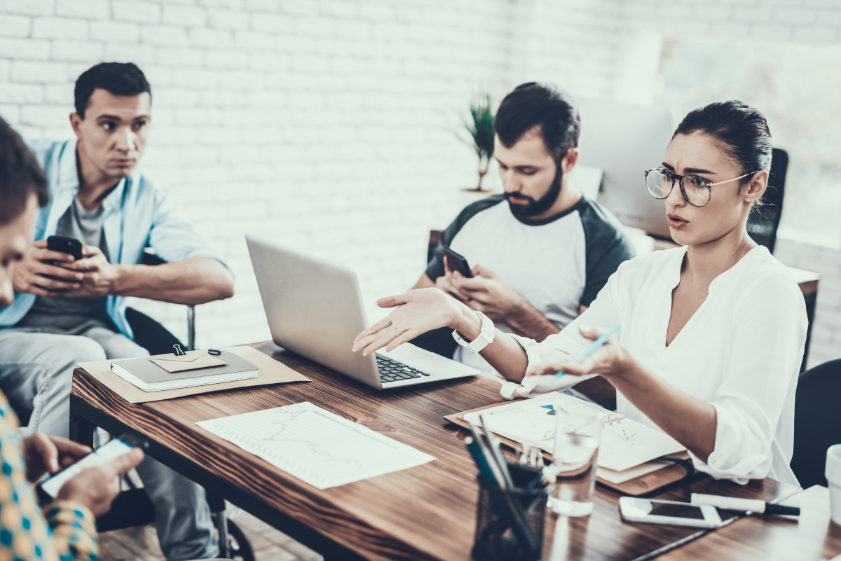 Female manager asking her managed service provider (MSP) key questions about their services