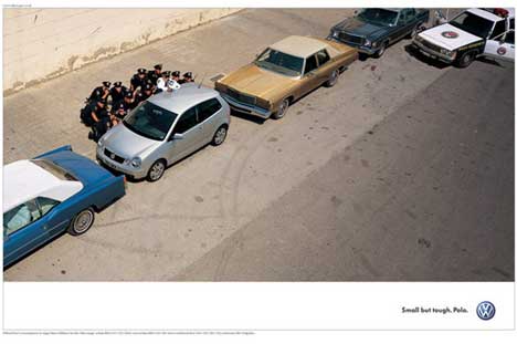 VW messaging: Police officers hiding behind a VW Polo during a gun battle