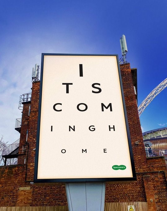 Specsavers billboard using classic eyesight test layout to write 'It's Coming Home'