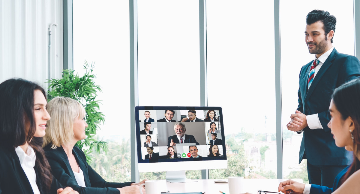 Hybrid Meetings are Biased. Here's How to Fix Them